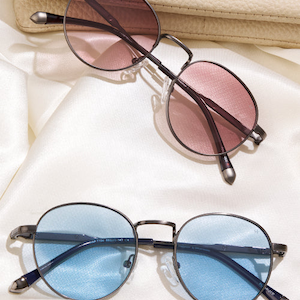 Rimless glasses on white display